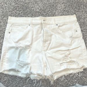 Distressed white shorts express